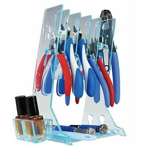 Tools such as nippers and pliers that tend to become cluttered during work can be stored stylishly and safely.  Organize your workspace and improve your production efficiency!  Up to 5 nippers or pliers can be stored on this stand.  The stand is made of highly flexible resin, so it is difficult to break. The bottom of the stand is ideal for storing pen-type tools such as pin vise, or hobby knives that can easily roll off your table.  Up to 7 can be stored at once!  Approximate size: Height: 190mm (7.5"), Wi