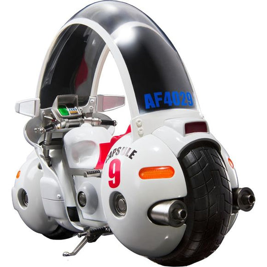 Expected to ship in January of 2026

From the first episode of "Dragon Ball", the bike Bulma was riding has appeared in S.H.Figuarts!

The roof panel and turn signal, head・tale lamp are molded in translucent plastic. The frame, front fork, muffler, and footrests are all made of diecast metal, giving the bike a satisfying sense of weight. It even comes with a display stand featuring the Capsule Corp. logo. It also includes an in-scale Goku. Plus, the stand lets you pose the bike statically, as if riding, or