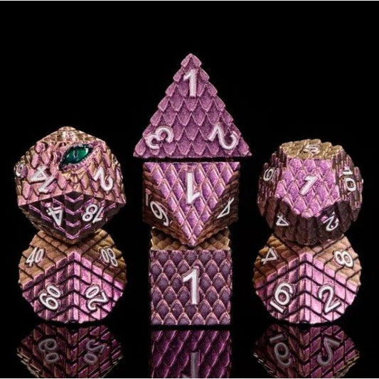 The perfect companion for your gaming needs! These premium die-cast polyhedral dice are exactly what you've been searching for that upcoming game night with the group. Each set weighs roughly 5 ounces and are stored in a quality, brushed metal tin with foam insert. These dice are engraved with crisp, easy-to-read numerals. Many styles and colors are available.
This set includes one of each: d20, d12, d10, d10 (percentile), d8, d6, and a d4 (7 dice in total). All inside a premium Dice Tin.