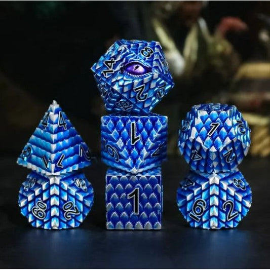The perfect companion for your gaming needs! These premium die-cast polyhedral dice are exactly what you've been searching for that upcoming game night with the group. Each set weighs roughly 5 ounces and are stored in a quality, brushed metal tin with foam insert. These dice are engraved with crisp, easy-to-read numerals. Many styles and colors are available.
This set includes one of each: d20, d12, d10, d10 (percentile), d8, d6, and a d4 (7 dice in total). All inside a premium Dice Tin.