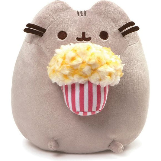 GUND is proud to present Pusheen — a Chubby Gray tabby cat that loves cuddles, snacks, and dress-up. As a popular web comic, Pusheen brings brightness and chuckles to millions of followers in her rapidly growing online fan base. This 9.5” upright plush version of Pusheen has her ready to enjoy a movie with an overflowing bucket of yummy Buttered popcorn! Surface-washable for easy cleaning. Appropriate for ages one and up. About GUND: for more than 100 years, GUND has been a premier plush Company recognized