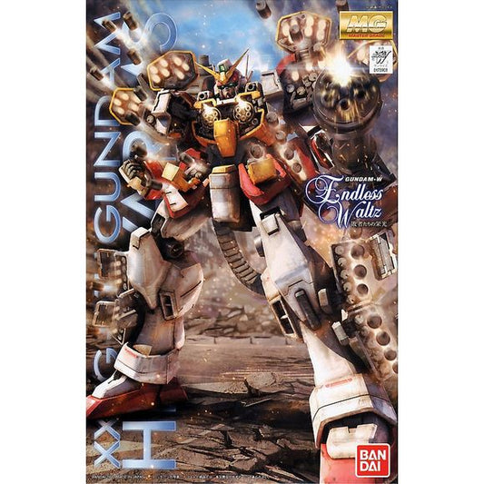 Bandai Hobby Gundam Wing Gundam Heavyarms Ver EW MG 1/100 Model Kit | Galactic Toys & Collectibles