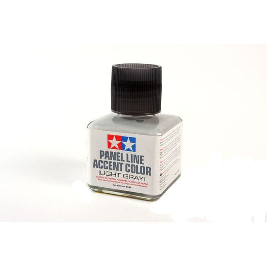Tamiya Panel Line enamel paints are ideal for highlighting panel lines and other details to give your model a more realistic depth. The paint has been pre-diluted into the ideal viscosity and can be easily applied into crevasses such as panel lines with the brush on the bottle cap. Once dried, any excess may be cleaned up by using enamel thinner. (Bottle contains 40ml)

Continental US Shipping Only