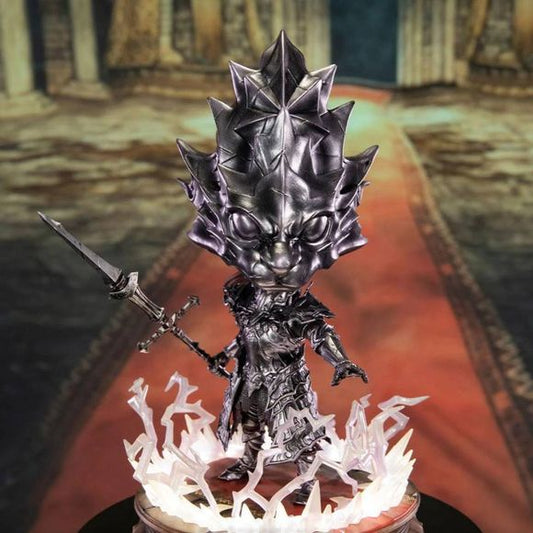 This statue has no edition number, and was a sample and is in new and unopened condition.

Similar to our resin statue of Dragon Slayer Ornstein, the base replicates the pillars found in the Anor Londo Cathedral boss room. And Ornstein himself has a ton of textured details like the resin, from the intricate design of his armor and spear to the battle damage weathering found throughout the statue. And with the Exclusive Edition, the lightning effects have LED lights in them with two modes—static and animated
