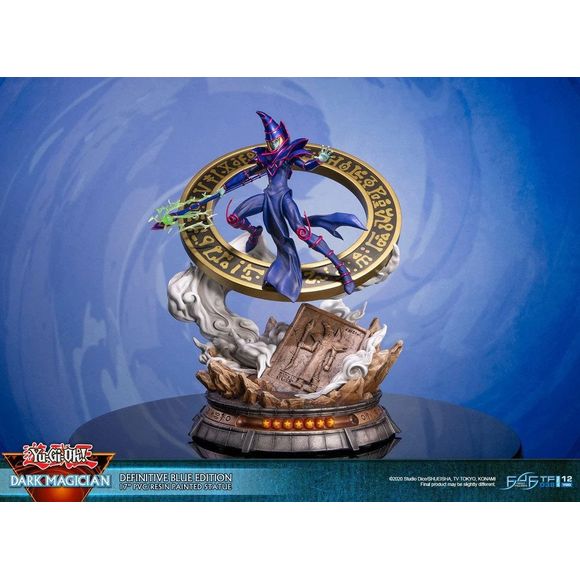 The statue's concept is inspired by one of Dark Magician's iconic summoning poses in the anime, where he's in this "ready for action" stance with the Dark Magical Circle in the background. He has his left arm stretched out and is wielding the Magician's Rod in his right hand, ready to cast his signature spell: Dark Magic Attack. The Definitive Edition of this statue comes with LED functionality for the Dark Magical Circle, as well as glow-in-the-dark attack effects on the Magician's Rod.

Since the Dark Mag