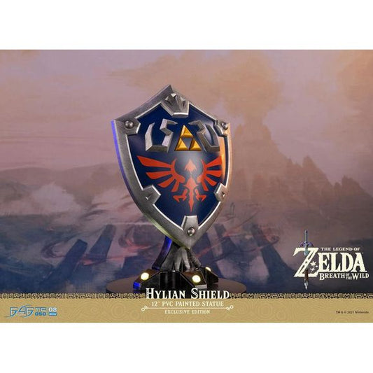 This statue has no edition number, and was a replacement and is in new and unopened condition. 

First 4 Figures is proud to introduce their latest PVC collectible, the Hylian Shield Exclusive Edition from The Legend of Zelda: Breath of the Wild.

The blue front with silver borders, the Triforce symbol, and Hyrule's crest are staples in its classic design, and this particular statue was inspired by the design from The Legend of Zelda: Breath of the Wild.

As for the base it's mounted on, the Hylian Shield a
