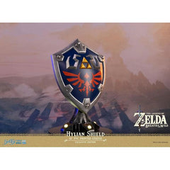 This statue has no edition number, and was a replacement and is in new and unopened condition. 

First 4 Figures is proud to introduce their latest PVC collectible, the Hylian Shield Exclusive Edition from The Legend of Zelda: Breath of the Wild.

The blue front with silver borders, the Triforce symbol, and Hyrule's crest are staples in its classic design, and this particular statue was inspired by the design from The Legend of Zelda: Breath of the Wild.

As for the base it's mounted on, the Hylian Shield a