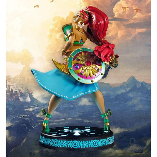 This statue has no edition number, and was a replacement and is in new and unopened condition. 

First 4 Figures proudly presents Gerudo Champion and pilot of the Divine Beast Vah Naboris: Urbosa Exclusive Edition! She is brought to life with stunning detail in this high-quality PVC statue. Her dynamic pose makes her appear in mid-twirl, with her skirt and hair flowing free. The base’s design features the Sheikah Eye symbol, consistent with the other statues in the First 4 Figures The Legend of Zelda: Breat