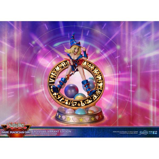 This statue has no edition number, and was a replacement and is in new and unopened condition. 

The “Vibrant” variation features Dark Magician Girl wearing a dark purple dress accented by dark pink details. For the exclusive edition, the Magician’s seal lights up with 2 LED functions: Static and Animated. When animated, lights swirl around the ring of the Seal as if Dark Magician Girl is preparing to use her Dark Burning Attack!