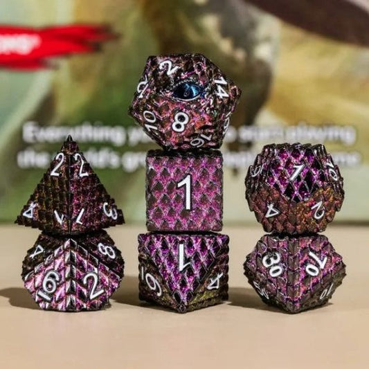 The perfect companion for your gaming needs! These premium die-cast polyhedral dice are exactly what you've been searching for that upcoming game night with the group. Each set weighs roughly 5 ounces and are stored in a quality, brushed metal tin with foam insert. These dice are engraved with crisp, easy-to-read numerals. Many styles and colors are available.

This set includes one of each: d20, d12, d10, d10 (percentile), d8, d6, and a d4 (7 dice in total). All inside a premium Dice Tin.