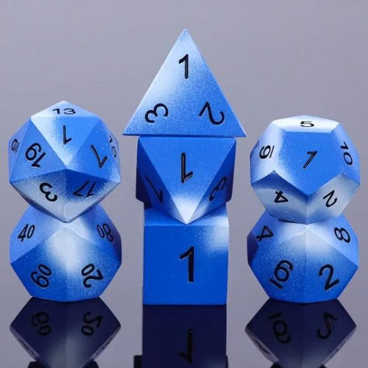 The perfect companion for your gaming needs! These premium die-cast polyhedral dice are exactly what you've been searching for that upcoming game night with the group. Each set weighs roughly 5 ounces and are stored in a quality, brushed metal tin with foam insert. These dice are engraved with crisp, easy-to-read numerals. Many styles and colors are available.

This set includes one of each: d20, d12, d10, d10 (percentile), d8, d6, and a d4 (7 dice in total). All inside a premium Dice Tin.