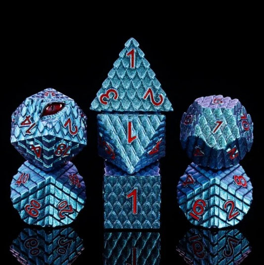 The perfect companion for your gaming needs! These premium die-cast polyhedral dice are exactly what you've been searching for that upcoming game night with the group. Each set weighs roughly 5 ounces and are stored in a quality, brushed metal tin with foam insert. These dice are engraved with crisp, easy-to-read numerals. Many styles and colors are available.

This set includes one of each: d20, d12, d10, d10 (percentile), d8, d6, and a d4 (7 dice in total). All inside a premium Dice Tin.