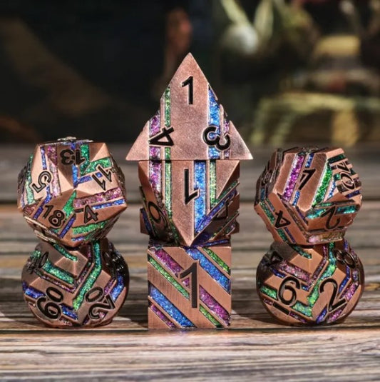 The perfect companion for your gaming needs! These premium die-cast polyhedral dice are exactly what you've been searching for that upcoming game night with the group. Each set weighs roughly 5 ounces and are stored in a quality, brushed metal tin with foam insert. These dice are engraved with crisp, easy-to-read numerals. Many styles and colors are available.

This set includes one of each: d20, d12, d10, d10 (percentile), d8, d6, and a d4 (7 dice in total). All inside a premium Dice Tin.