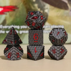 The perfect companion for your gaming needs! These premium die-cast polyhedral dice are exactly what you've been searching for that upcoming game night with the group. Each set weighs roughly 5 ounces and are stored in a quality, brushed metal tin with foam insert. These dice are engraved with crisp, easy-to-read numerals. Many styles and colors are available.

This set includes one of each: d20, d12, d10, d10 (percentile), d8, d6, and a d4 (7 dice in total). All inside a premium Dice Tin.
