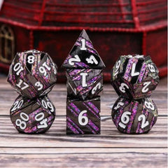 The perfect companion for your gaming needs! These premium die-cast polyhedral dice are exactly what you've been searching for that upcoming game night with the group. Each set weighs roughly 5 ounces and are stored in a quality, brushed metal tin with foam insert. These dice are engraved with crisp, easy-to-read numerals. Many styles and colors are available.

This set includes one of each: d20, d12, d10, d10 (percentile), d8, d6, and a d4 (7 dice in total). All inside a premium Dice Tin.