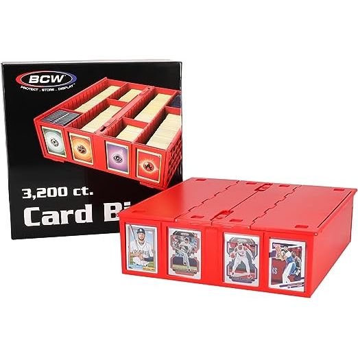 The BCW Card Bin is a premium version of the cardboard, 4-row Monster Box. Instead of corrugated cardboard, Card Bins are made from durable, acid-free plastic.
Card Bins have a pair of hinged lids that tuck under the bins when open. When closed, latches keep the lids shut and cards secure.
Card Bins are stackable with feet on the bottom that rest in the lid of the bin below it to prevent sliding.
The rows in the bins are notched along the top to hold removable partitions. Four Card Bin Partitions come with