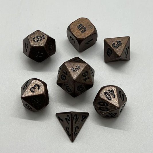 The perfect companion for your gaming needs! These premium die-cast polyhedral dice are exactly what you've been searching for that upcoming game night with the group. Each set weighs roughly 5 ounces and are stored in a quality, brushed metal tin with foam insert. These dice are engraved with crisp, easy-to-read numerals. Many styles and colors are available.

This set includes on of each: d20, d12, d10, d10 (percentile), d8, d6, and a d4 (7 dice in total). All inside the Galactic Toys Dice Tin.